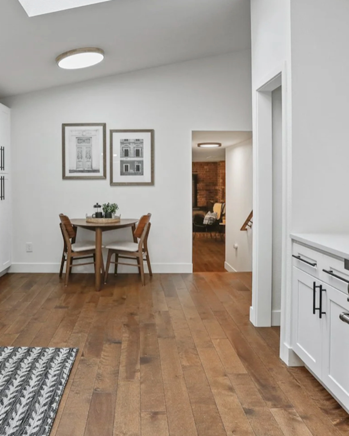 Renovated white kitchen with skylights